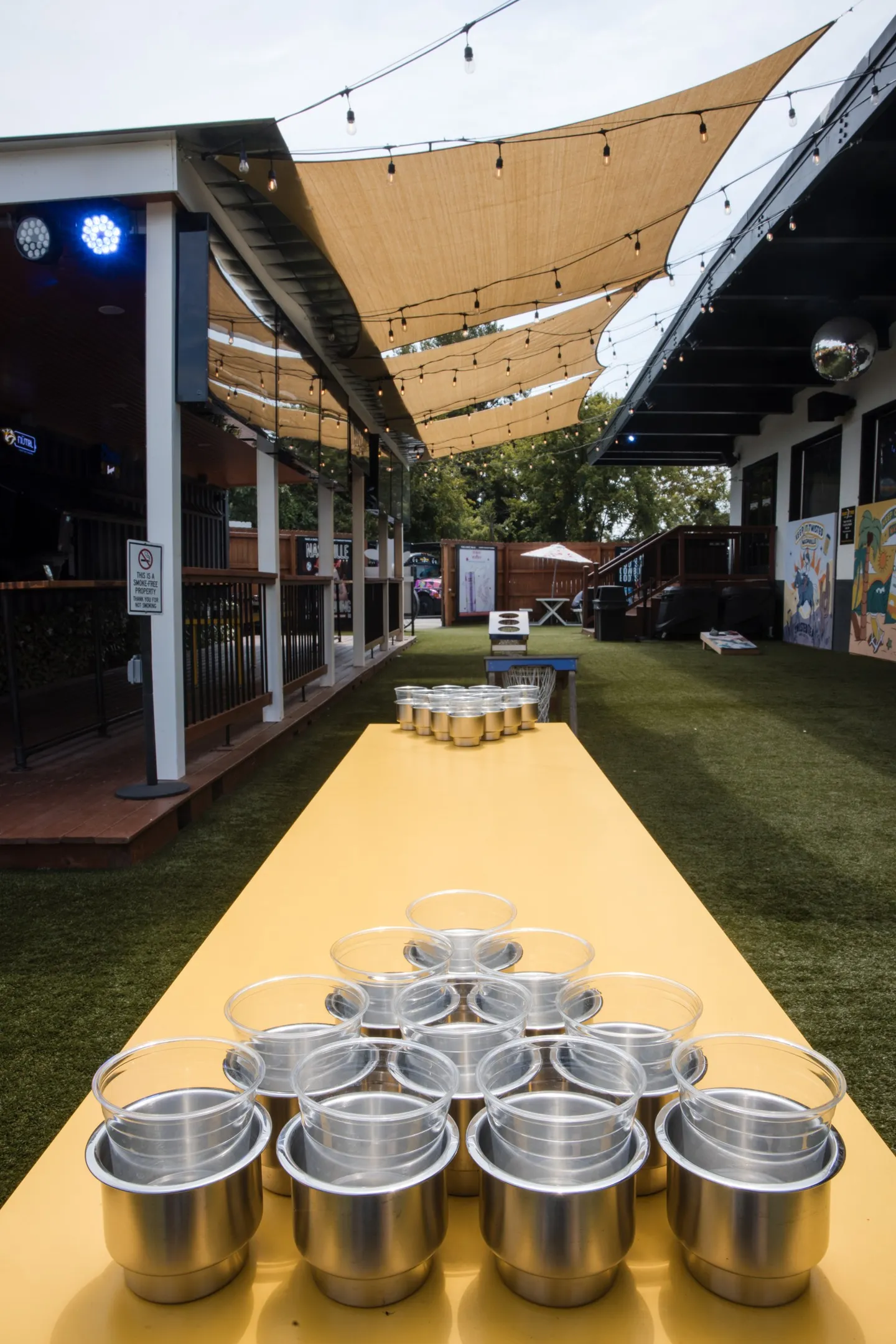 Table games in the outdoor Beer Garden at Honky Tonk Hideaway