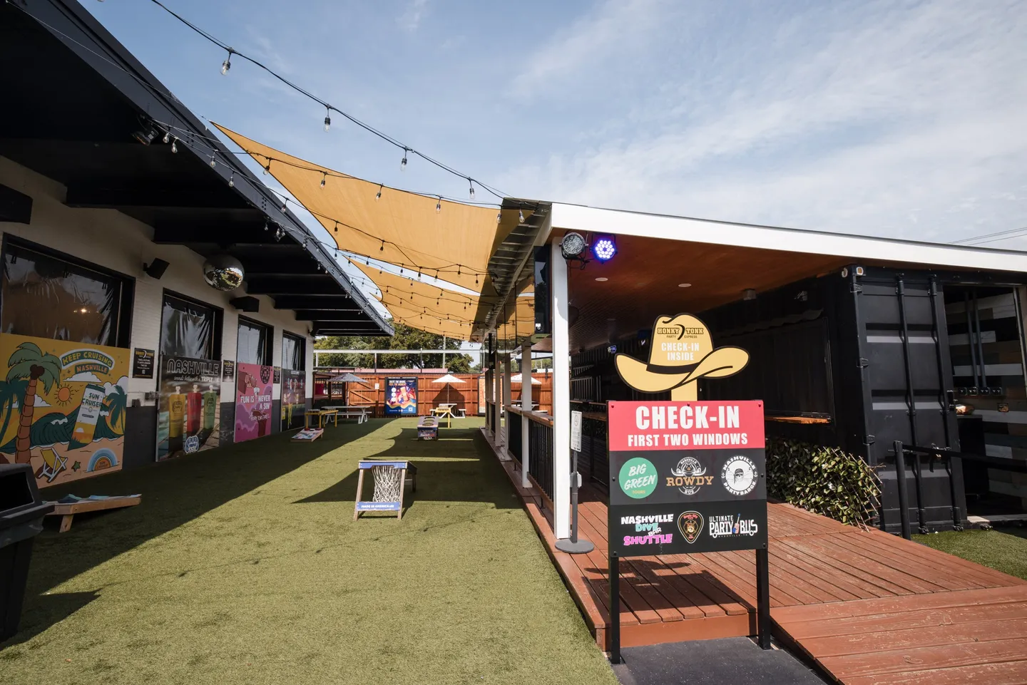 Party bus check-in beside the Honky Tonk Hideaway Beer Garden
